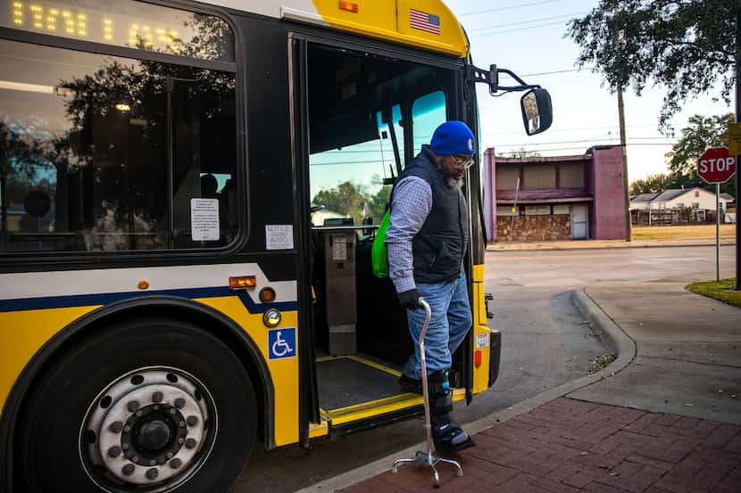 Randy eased himself off one of several DART buses he took to get to an appointment at the...