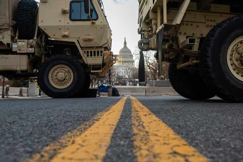 National Guard troops block traffic near the U.S. Capitol on January 19, 2021. Tens of...