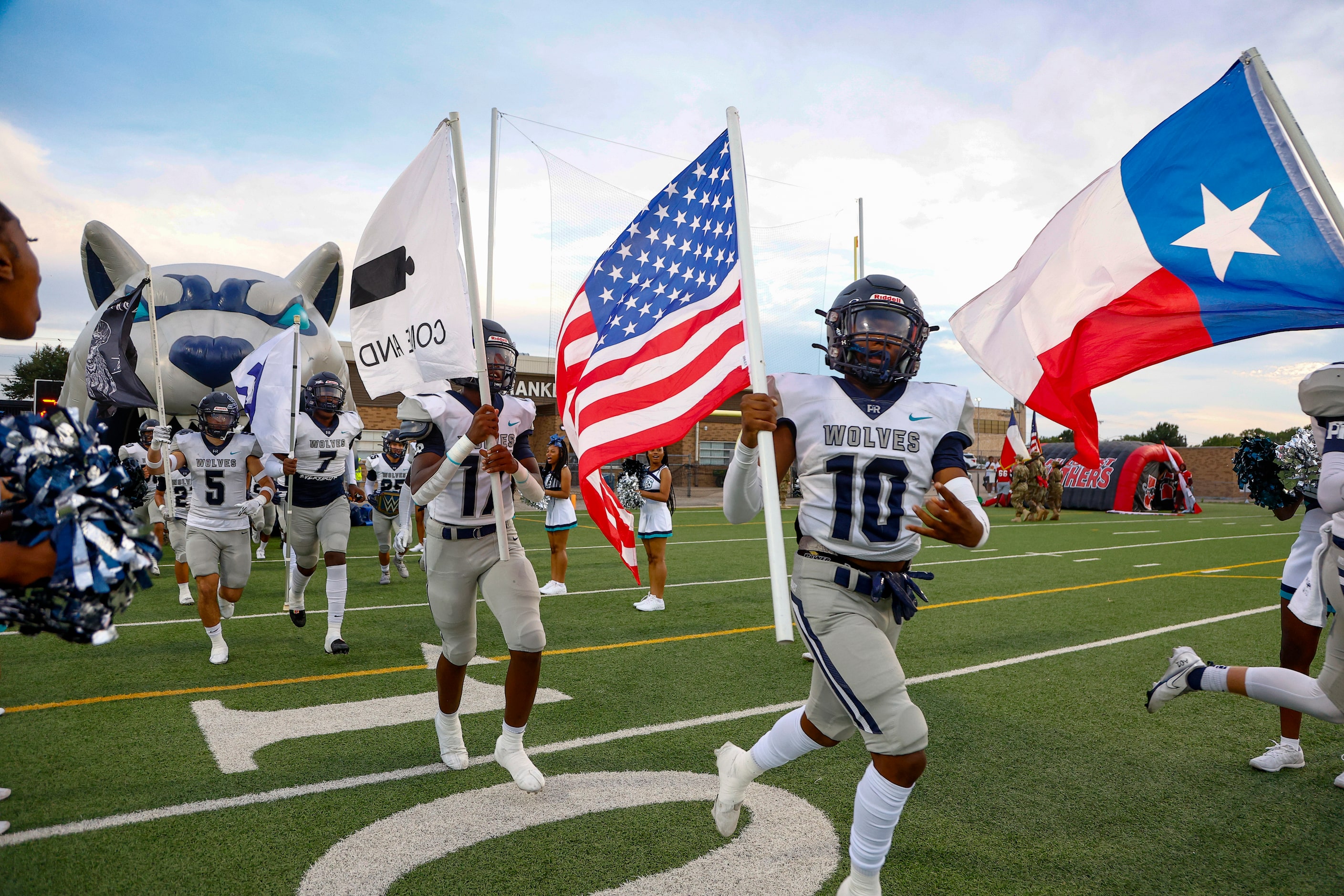 Carrollton Ranchview junior Daniel Okoro (10) runs onto the field with his teammates for the...