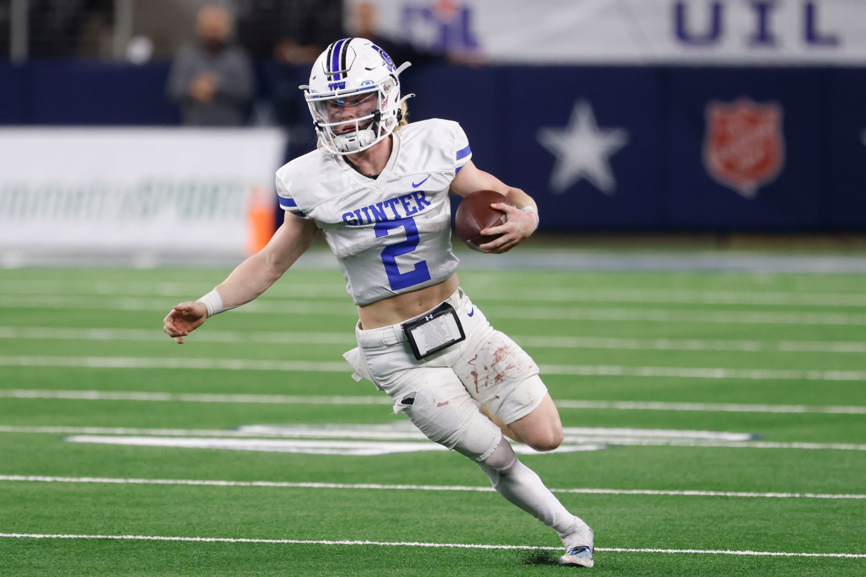 Gunter High’s Walker Overman runs with the ball against El Maton Tidehaven during the second...