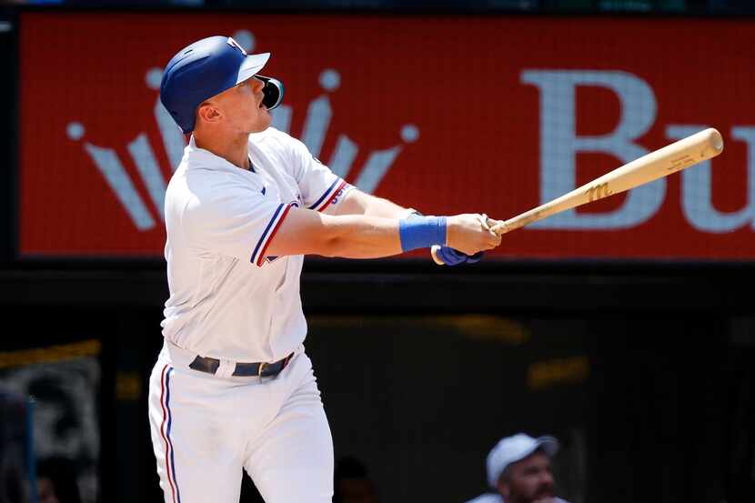 Texas Rangers third baseman Josh Jung (6) watches his two-run homer during the fifth inning...