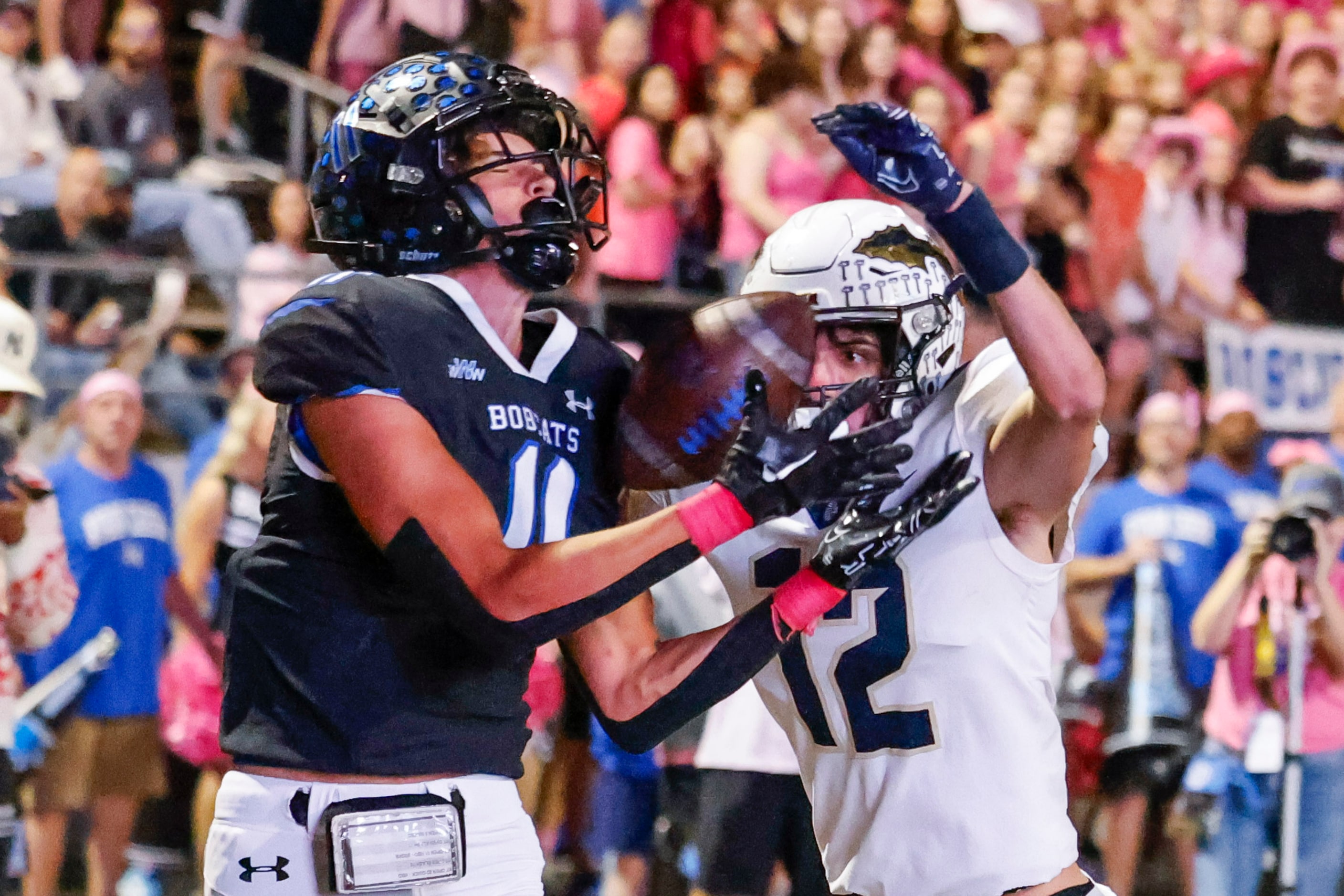 Byron Nelson High School’s Leo Almanza (11) scores a touchdown past Keller’s Landon Brown...