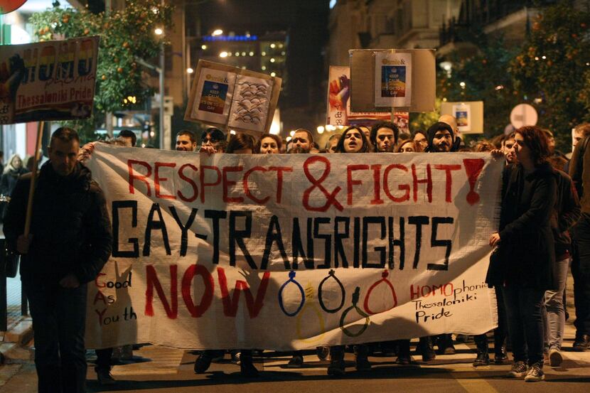 Demonstrators marched during a protest against a controversial anti-gay and blasphemy laws...