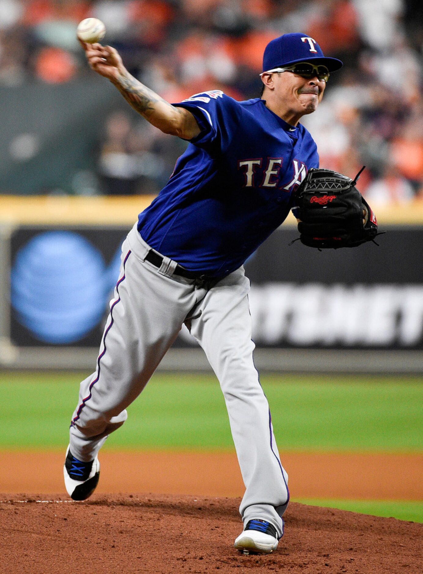 Texas Rangers starting pitcher Jesse Chavez delivers during the first inning of the team's...