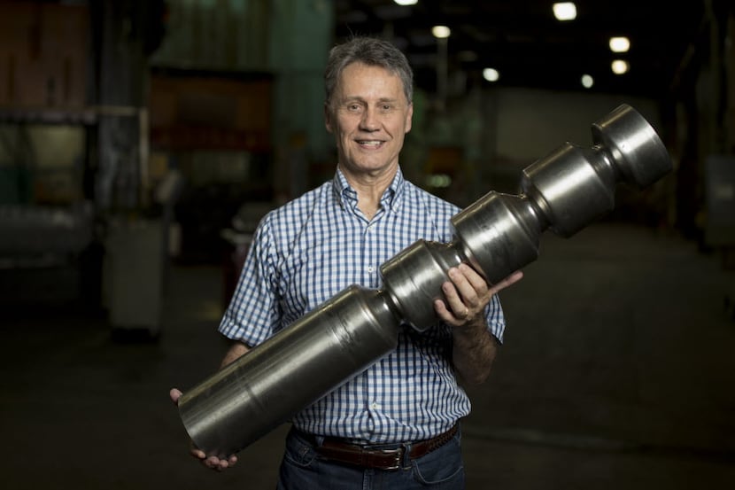 John Buttles, President of Bailey Tool & Manufacturing poses for a portrait with a steel...