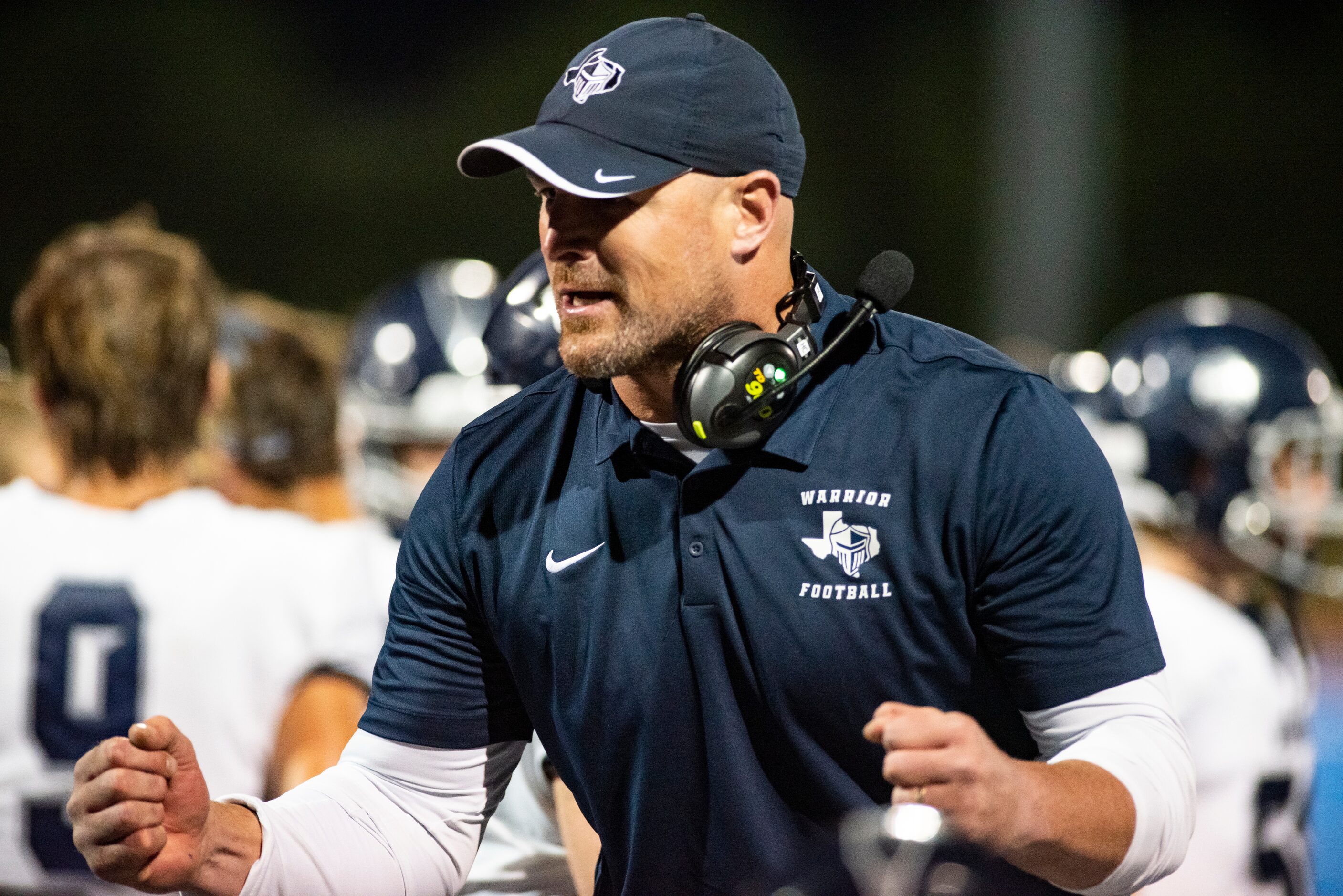 Argyle Liberty Christian Head Coach Jason Witten encourage his players after scoring a...