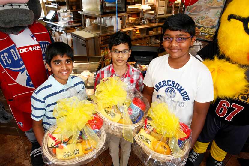 From left: Spelling bee co-champions Abhijay Kodali of Flower Mound, Sohum Sukhatankar of...