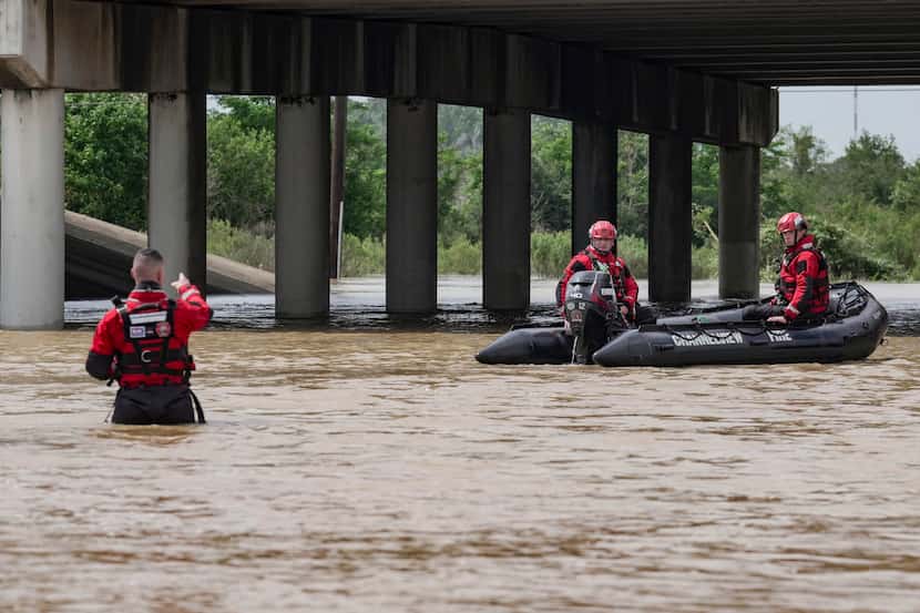 Channelview Fire Department and sheriffs get ready to help evacuate the area due to severe...