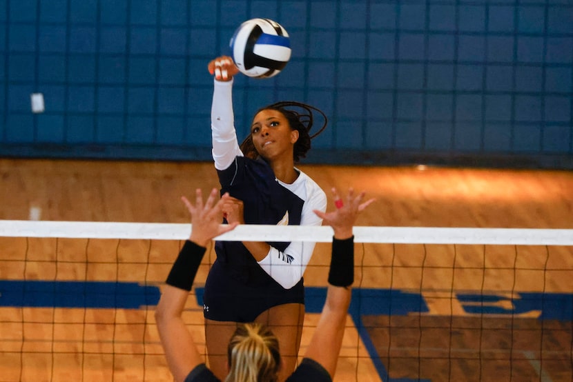 Prestonwood Christian Academy’s Jadyn Livings digs the ball against Episcopal School of...