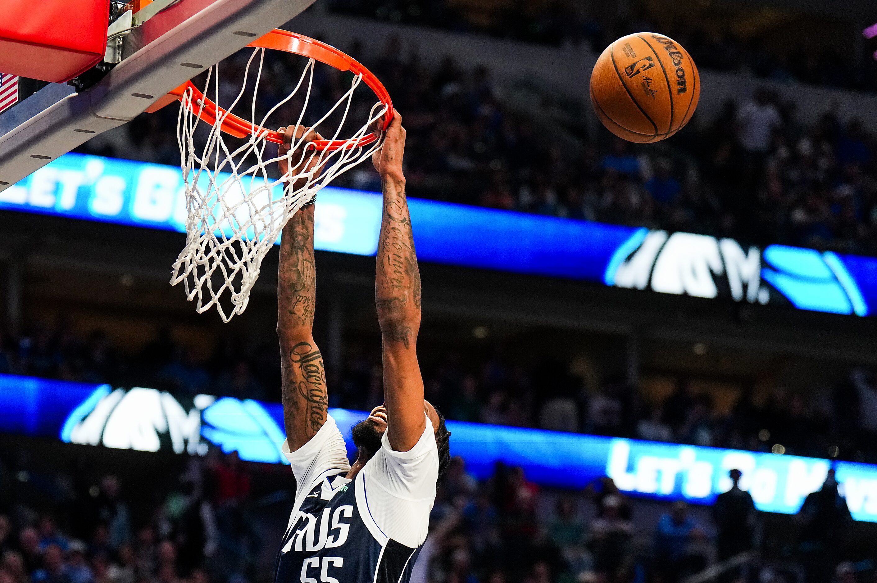 Dallas Mavericks forward Derrick Jones Jr. (55) misses on a dunk attempt during the second...