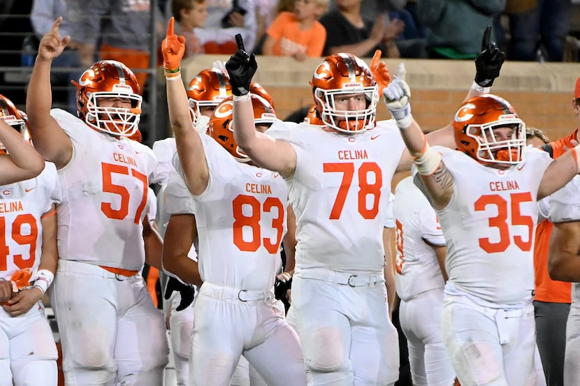 Celina players celebrate after their 34-0 win of a Class 4A Division II Region I final high...