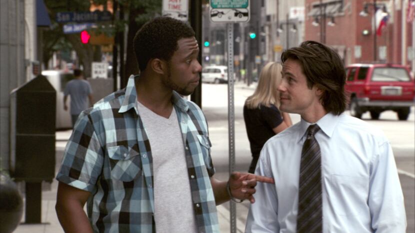 Chris (Akron Watson) talks with Brady Gray (Andrew Cheney)  in Seasons of Gray in a scene...