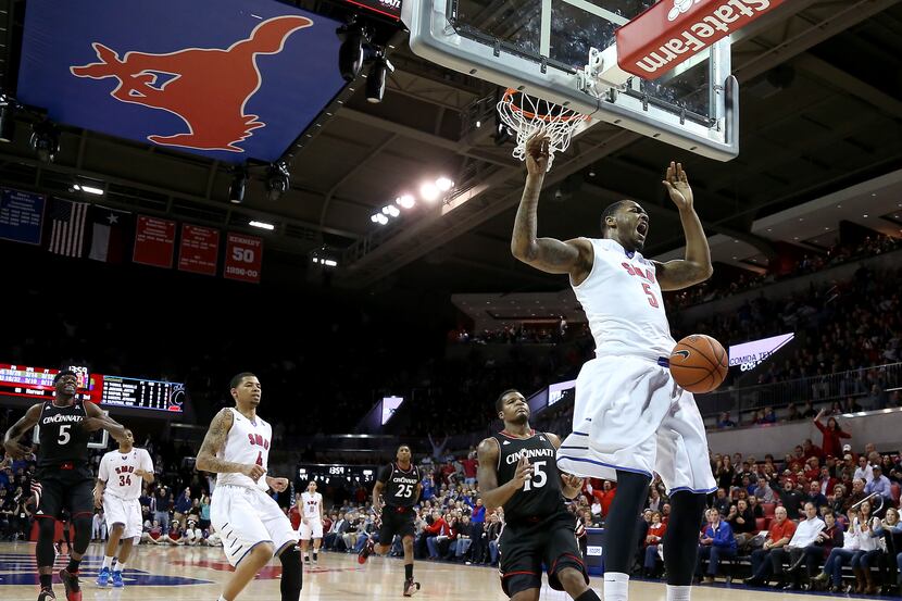 SMU Mustangs forward Markus Kennedy (5) dunks against the Cincinnati Bearcats in the second...