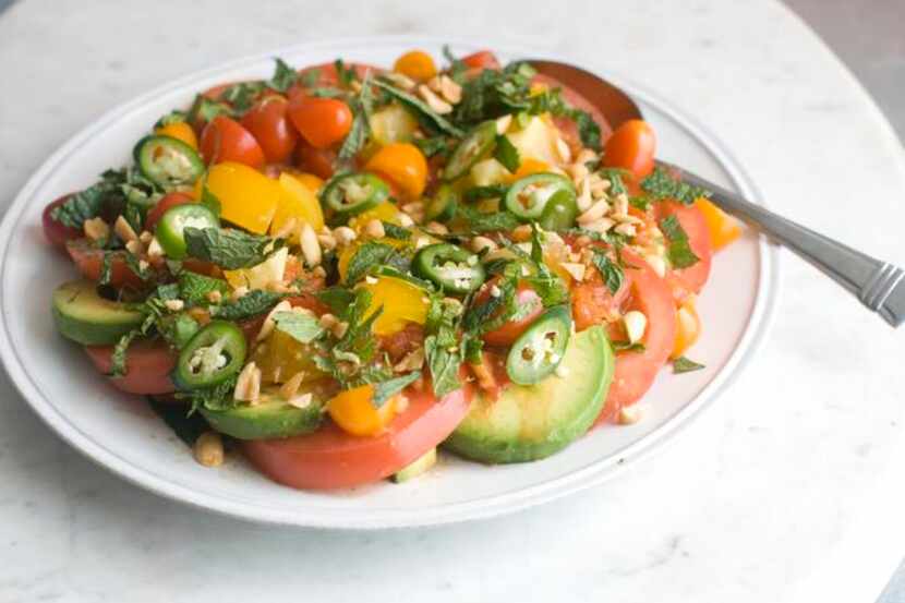 
Absolutely ripe tomatoes are essential in this salad. The sliced chiles help tame the...