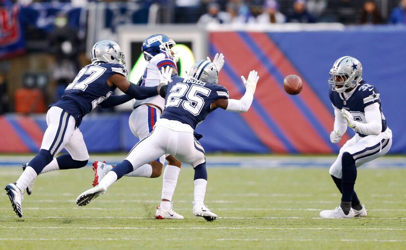 Dallas Cowboys cornerback Jourdan Lewis (27), Dallas Cowboys strong safety Xavier Woods (25)...