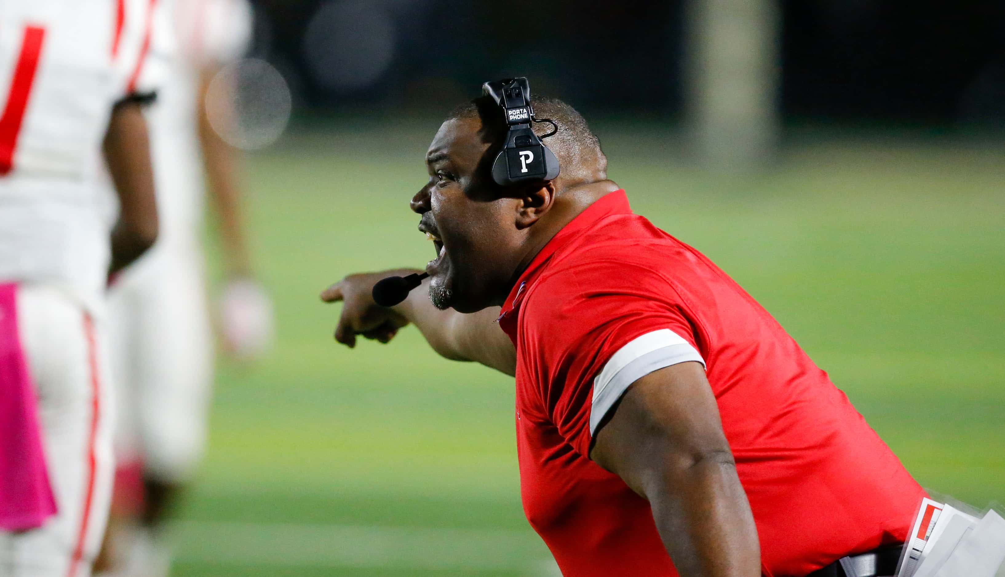 Terrell head coach Marvin Sedberry Jr. argues for a call during the first half of a high...