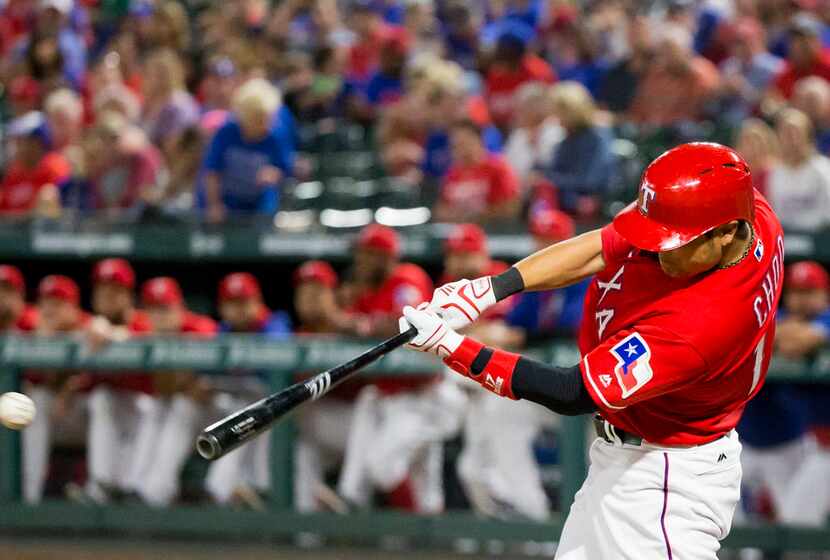 Texas Rangers outfielder Shin-Soo Choo singles in his first at bat since returning from the...