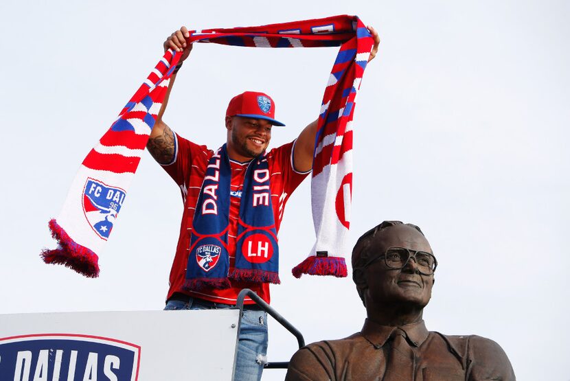 Dallas Cowboys quarterback Dak Prescott performs the scarfing ceremony before the MLS soccer...