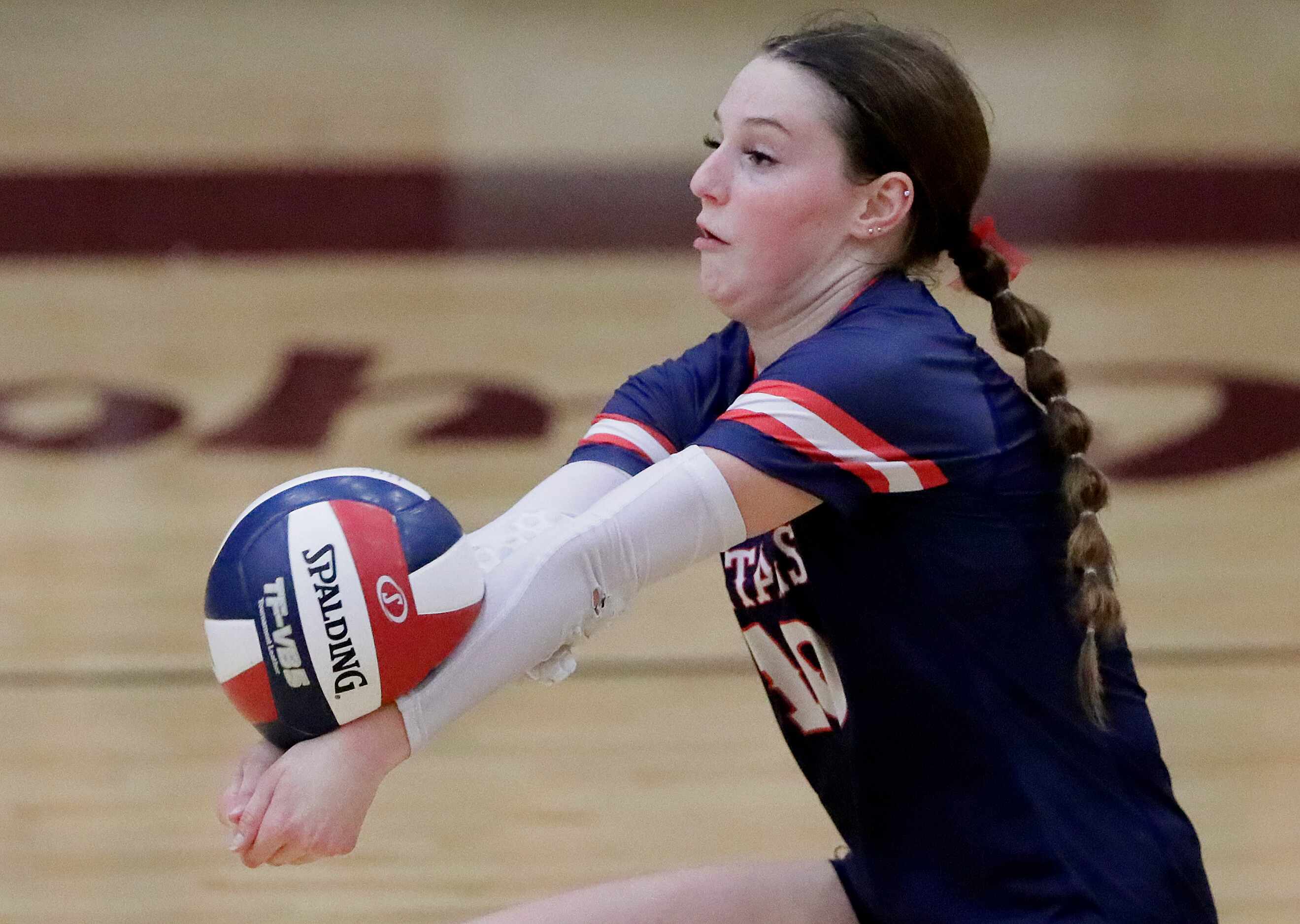 Centennial High School libero Ashlyn Jones (10) receives a serve during game two as Wakeland...