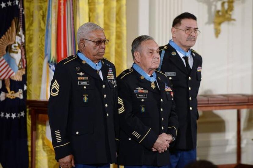 
President Barack Obama awarded the Medal of Honor to veterans Sgt. 1st Class Melvin Morris,...