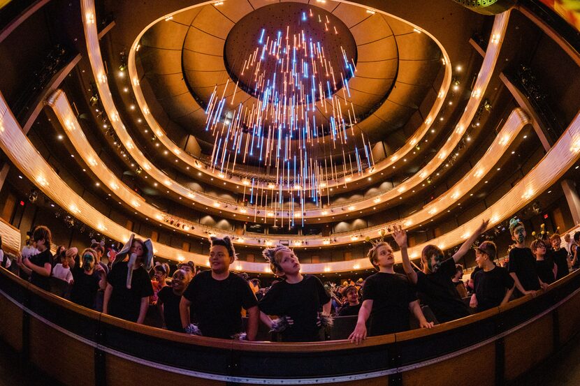 Kids gather around for a picture at Winspear Opera House in Dallas.