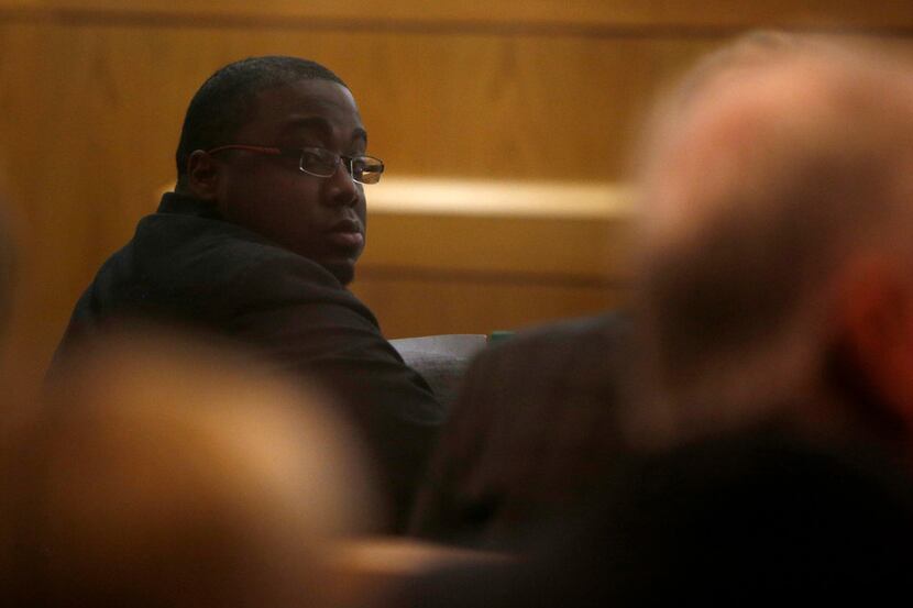Antonio Cochran sits with his defense team during his capital murder trial this week.