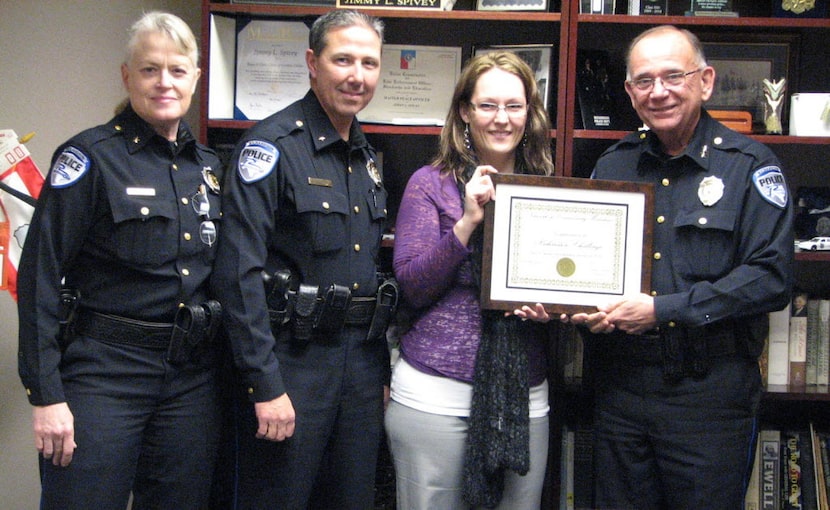  Network volunteer coordinator Elizabeth Wheeler (second from right) presents Richardson...