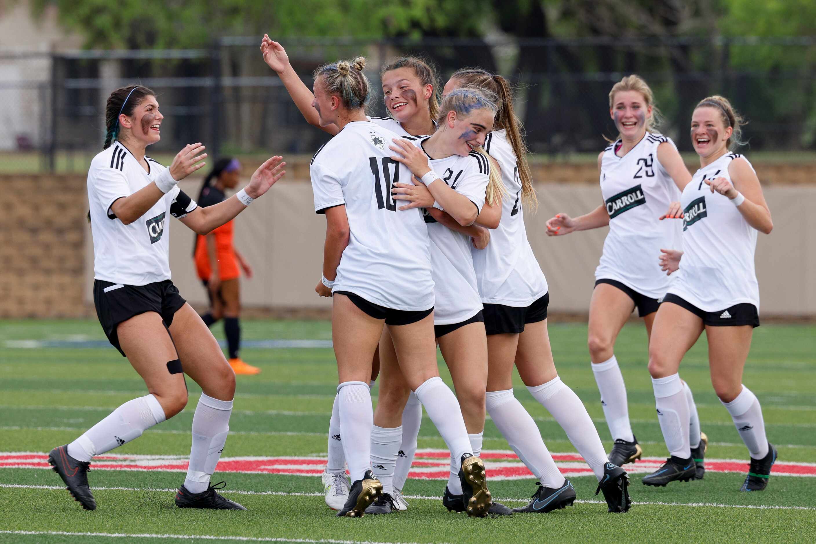 Southlake Carroll celebrate a goal by midfielder Kennedy Fuller (10) during the first half...