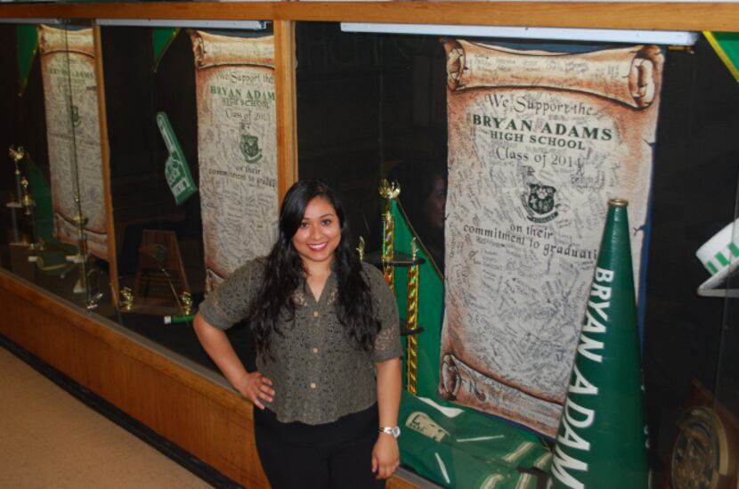 Esmeralda Cortez, ASP college counselor at Bryan Adams High School, works with students on...