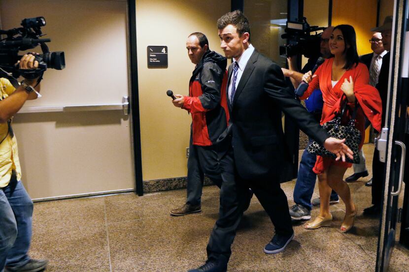 Johnny Manziel left the Frank Crowley Courts Building on Thursday, after prosecutors said in...