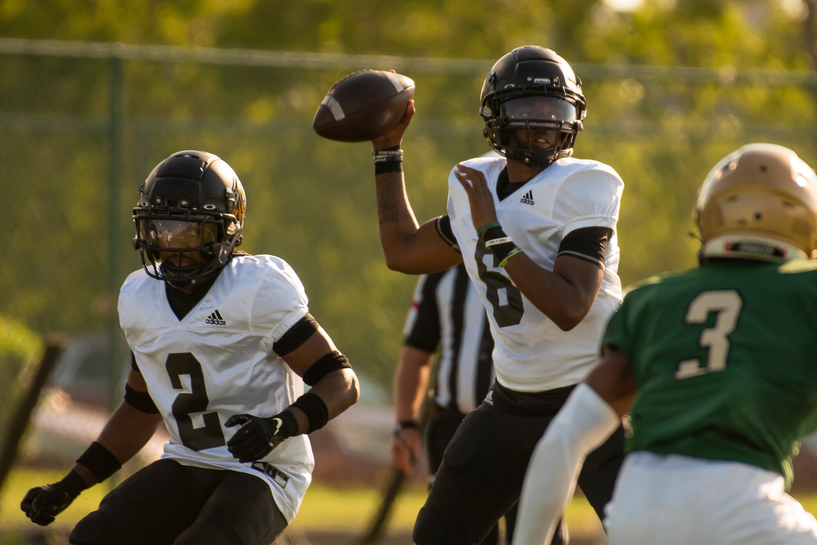 South Oak Cliff senior Trey Walton (6) prepares to pass the ball during DeSoto’s home game...