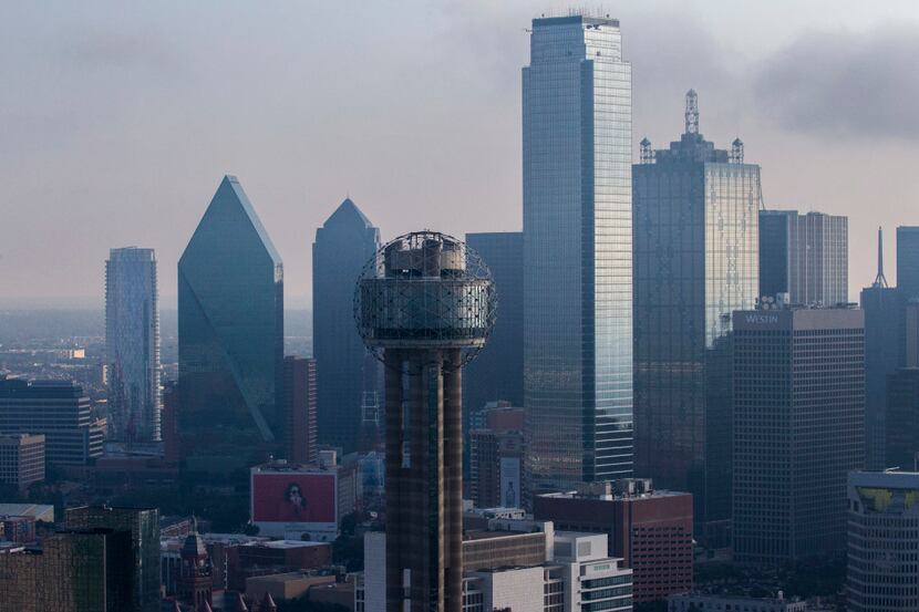 Reunion Tower and downtown Dallas -- including the Bank of America tower (tallest building)...