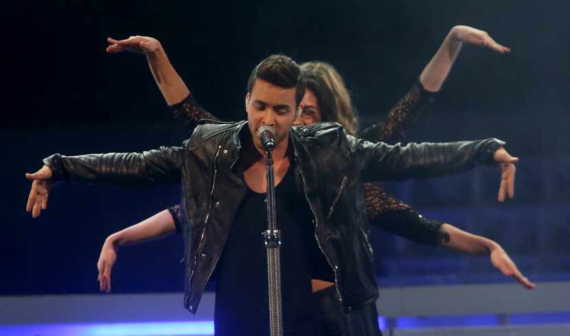 Prince Royce performs as the lead off for Ariana Grande Saturday, October 11, 2015, at...