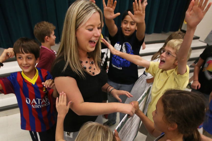 Renee Hayes, a fourth-grade teacher at  Prairie Creek Elementary in Richardson, got hugs and...