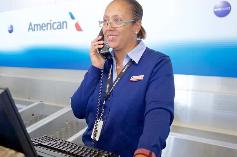 American Airlines customer service agent Yolanda Walter sported one of the new uniforms at...