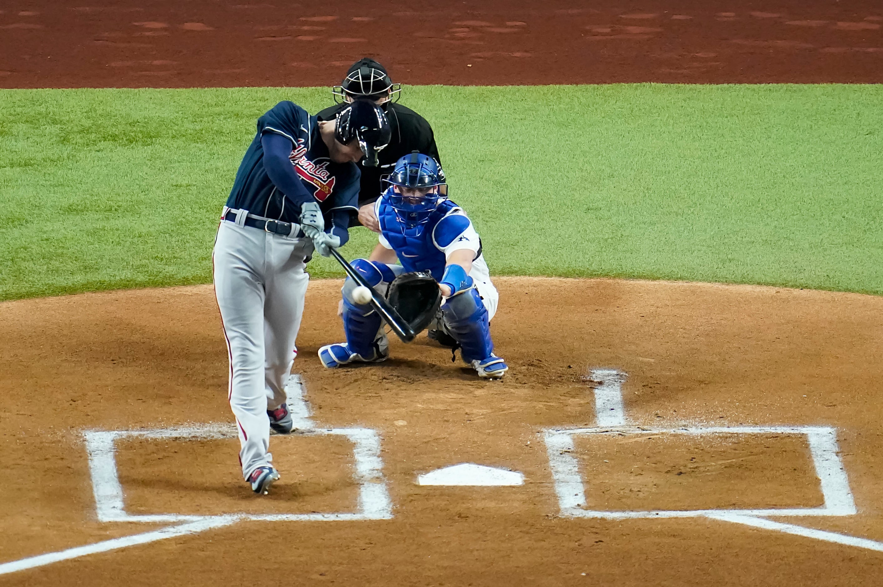 Atlanta Braves first baseman Freddie Freeman hits a solo home run during first inning in...