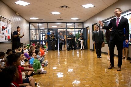 Texas Education Commissioner Mike Morath says hi to students on Monday, Aug. 15, 2022, at. 