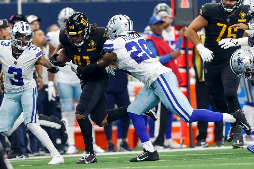 Washington Commanders running back Jonathan Williams (41) is tackled by Dallas Cowboys...