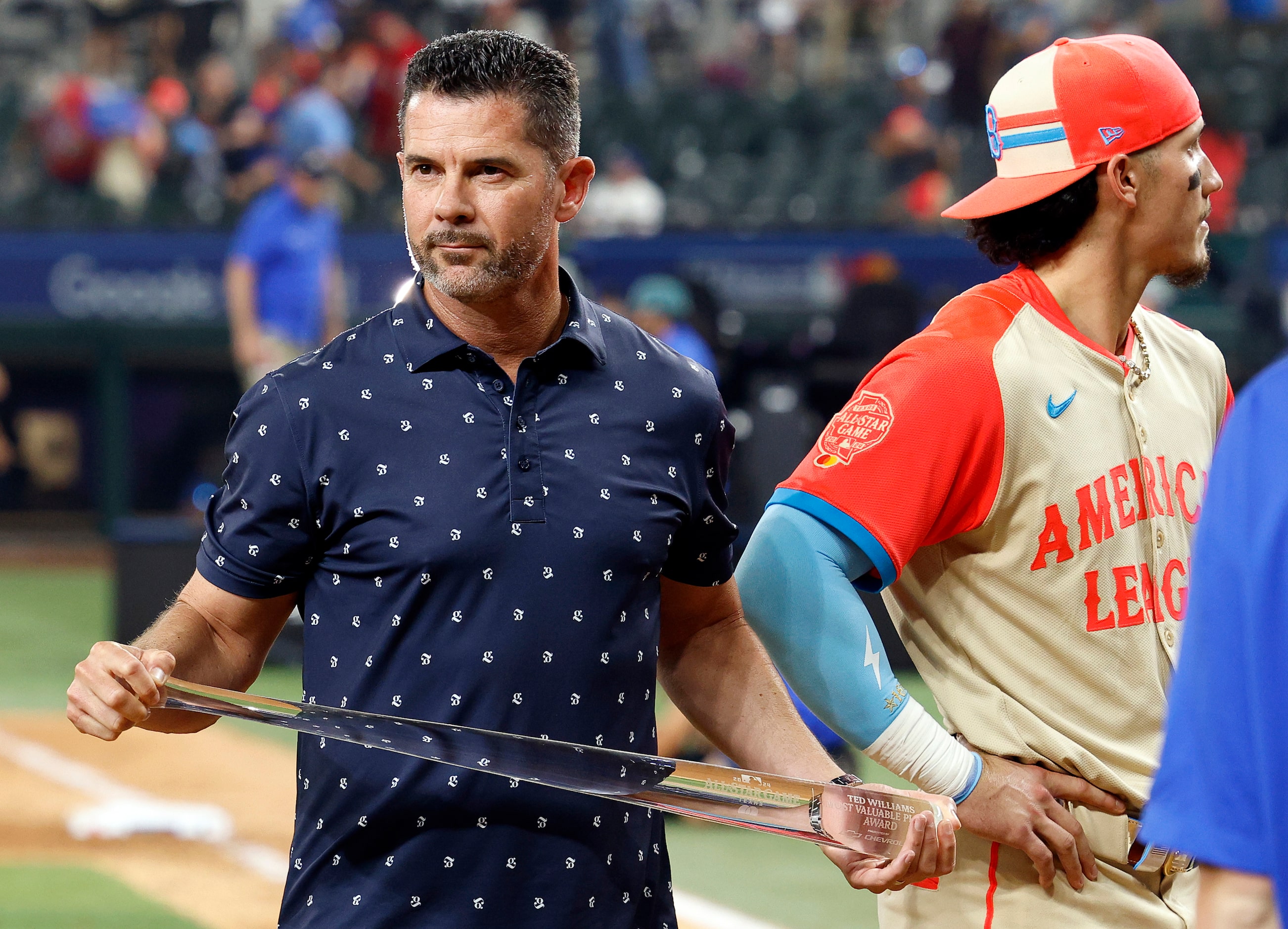 Former Texas Rangers infielder Michael Young waits to present the All-Star Game MVP award to...