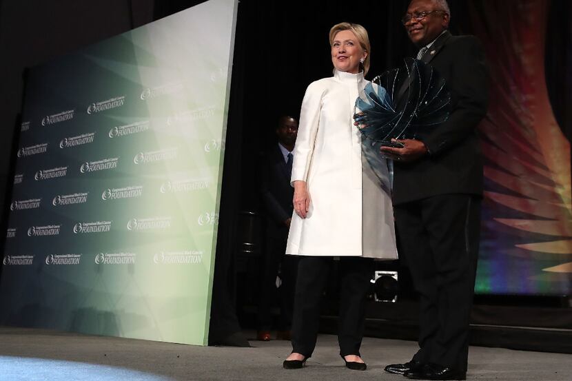 WASHINGTON, DC - SEPTEMBER 17: US Presidential nominee Hillary Clinton is presented with the...