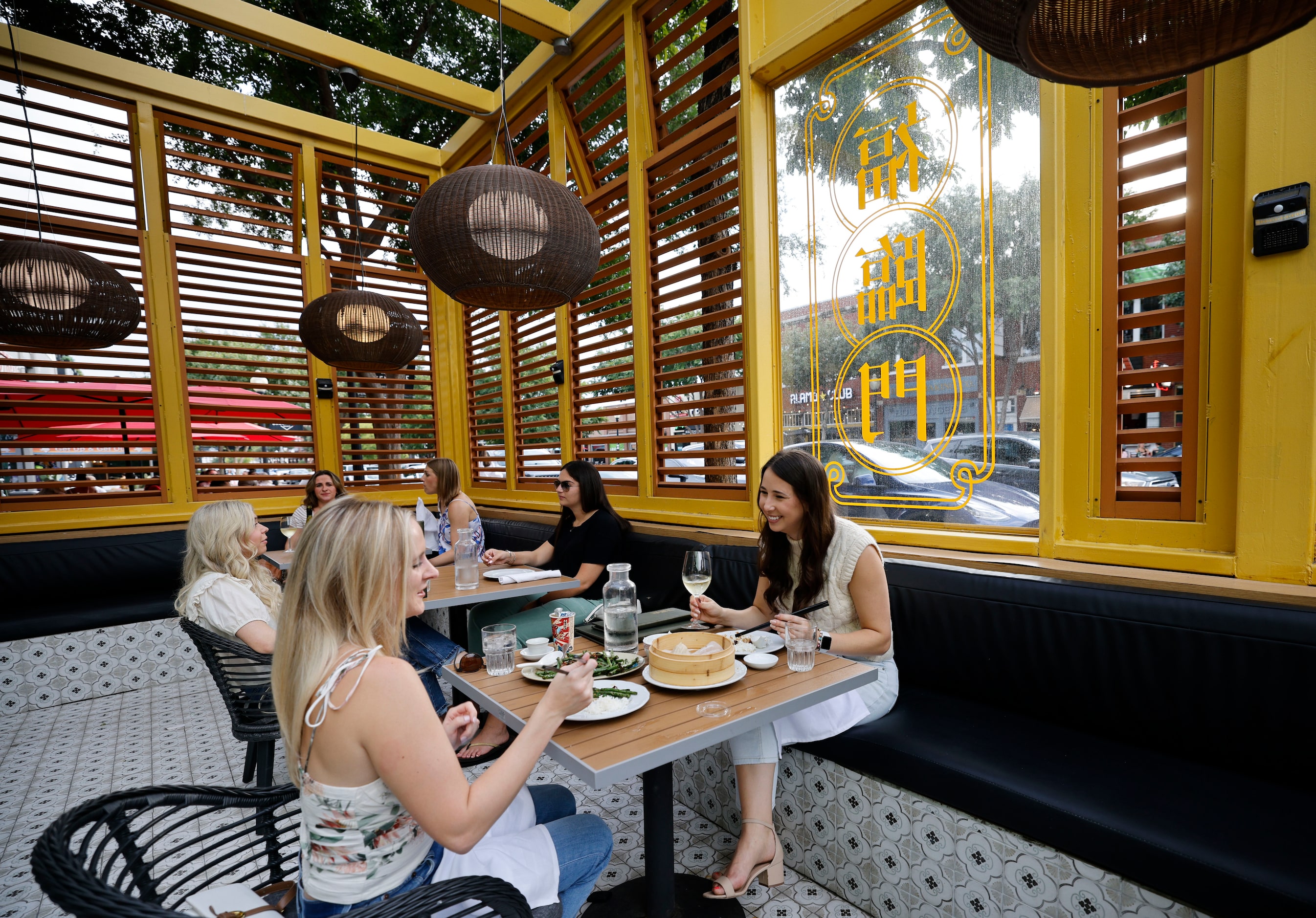 Haley Broughton, right and her friend Emma McCartney, both from McKinney have dinner on the...