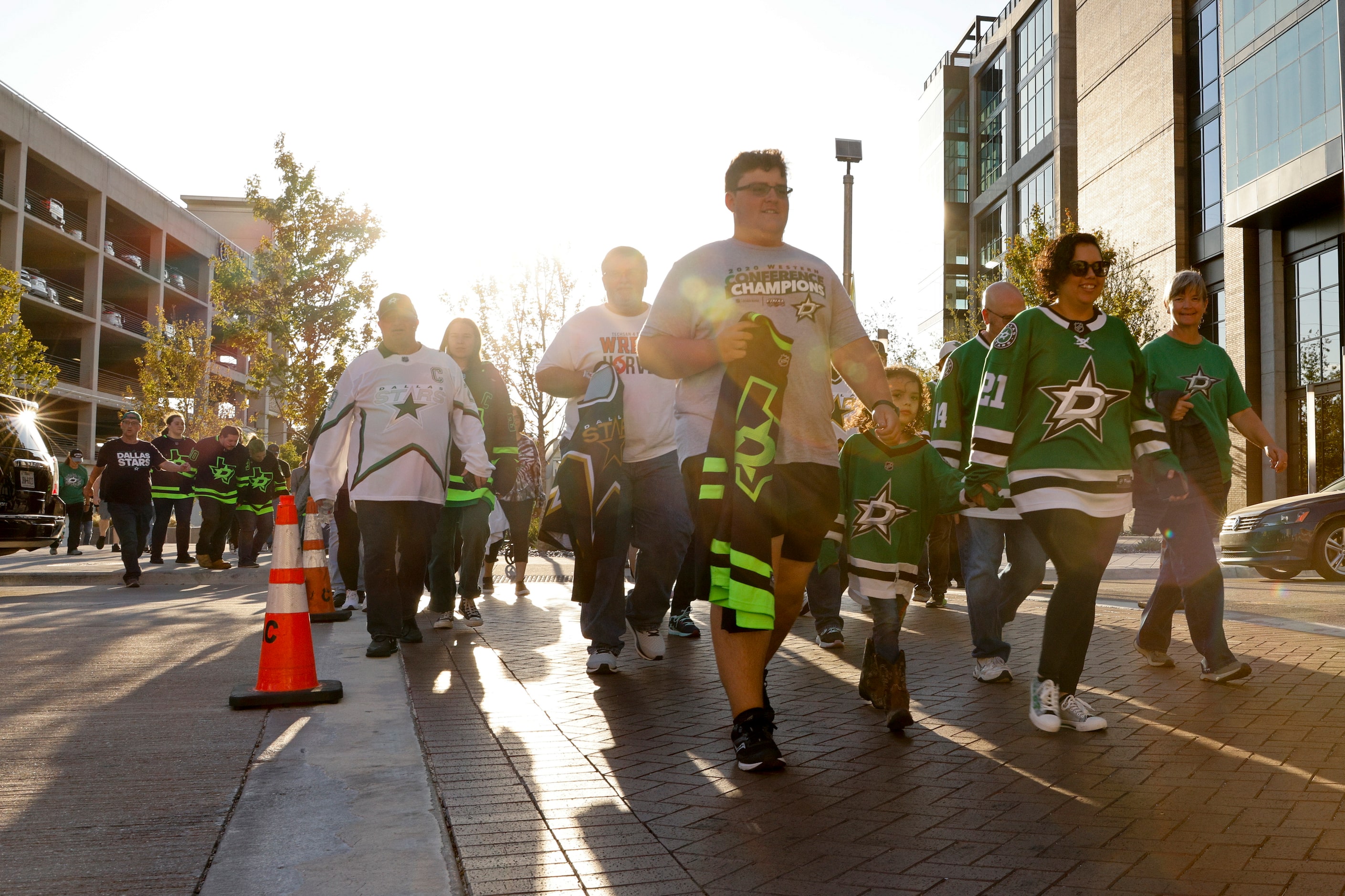 Dallas Stars fans cross Victory Avenue before the start of the Stars home opener against the...