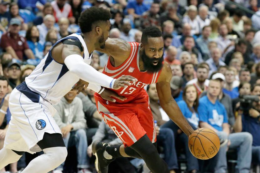 Houston Rockets guard James Harden (13) drives against Dallas Mavericks guard Wesley...