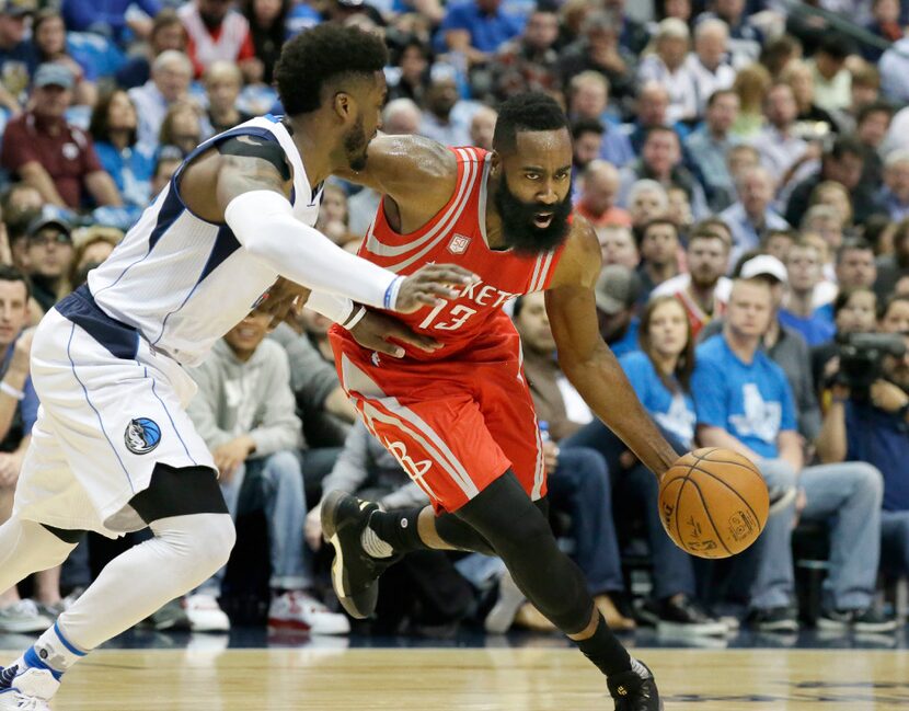 Houston Rockets guard James Harden (13) drives against Dallas Mavericks guard Wesley...