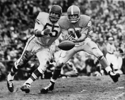 Dallas Texans linebacker E.J. Holub breaks up a pass during the 1962 AFL Championship in...