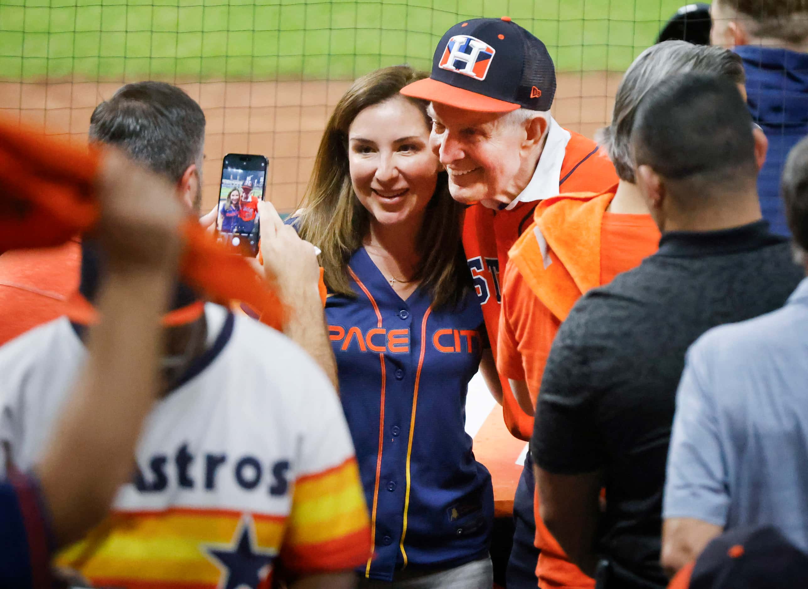 Well know Houston Astros fan James ‘Mattress Mack’ McIngvale poses for a photo with a fan...