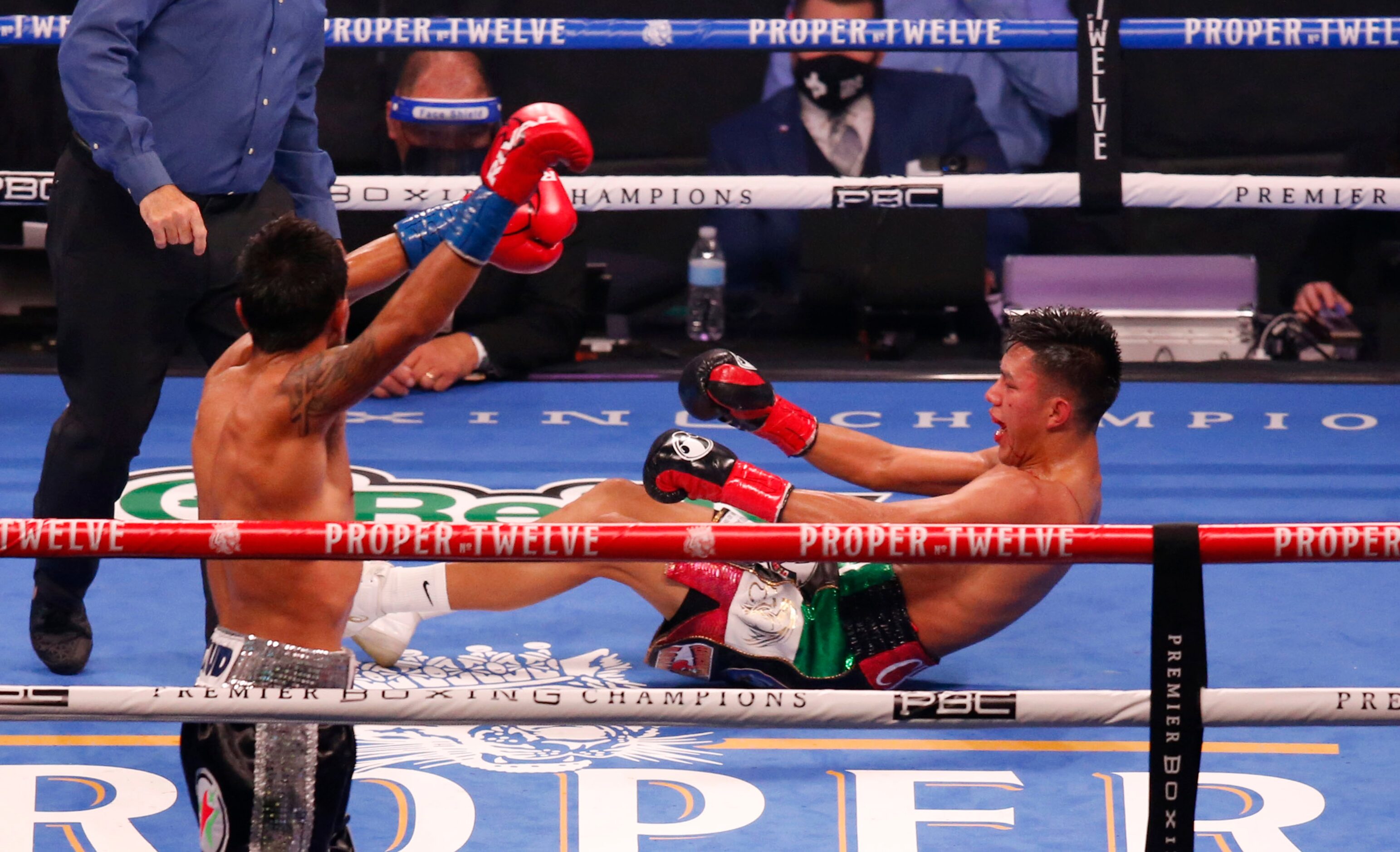 Eduardo Ramirez celebrates after knocking out Miguel Flores during the fifth round at AT&T...