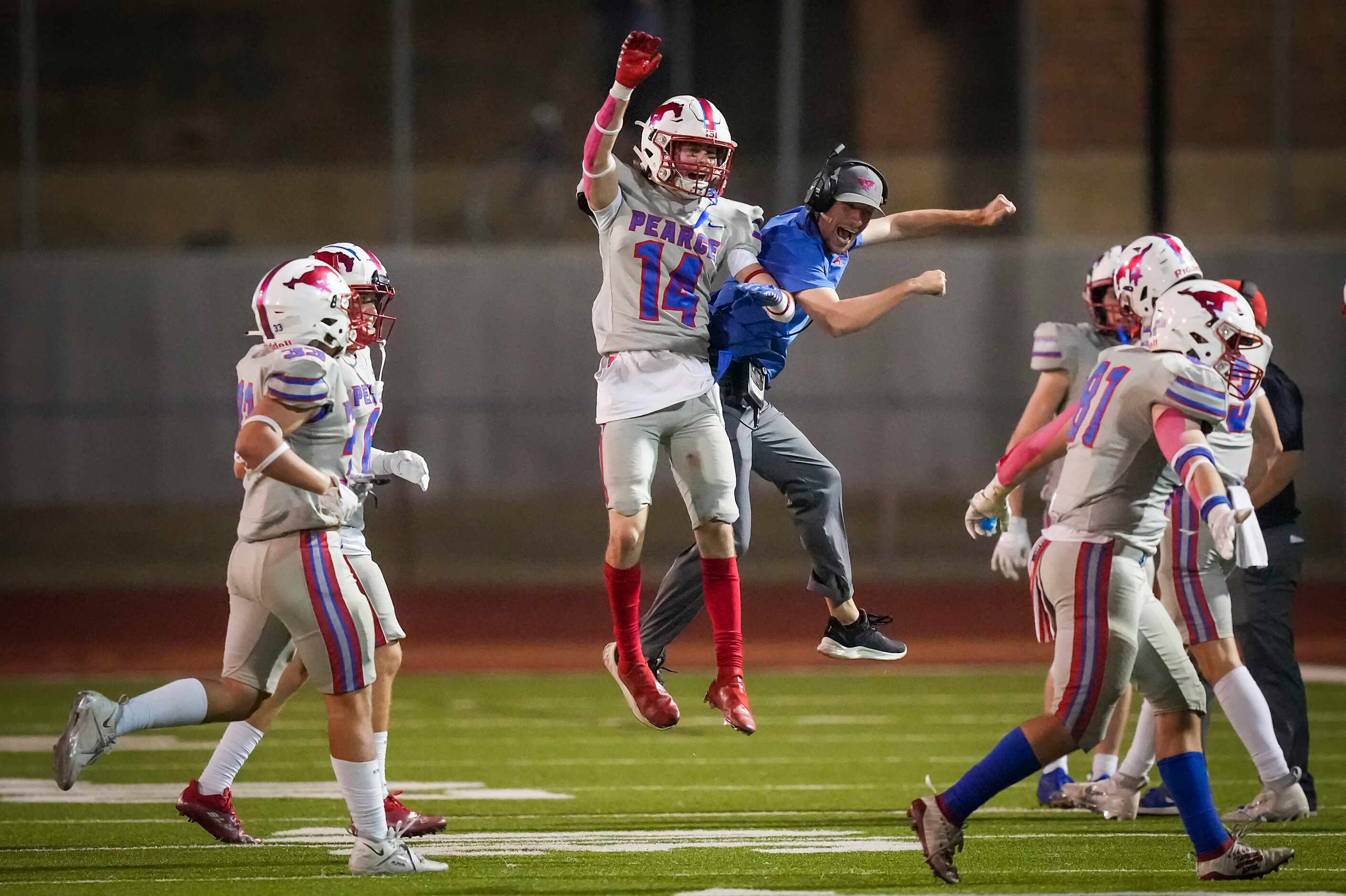 Richardson Pearce defensive back Tate Navin (14) celebrates after intercepting a pass during...