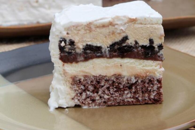 
Caramel Chocolate Crunch Ice Cream Cake has layers of chocolate cake, vanilla ice cream,...