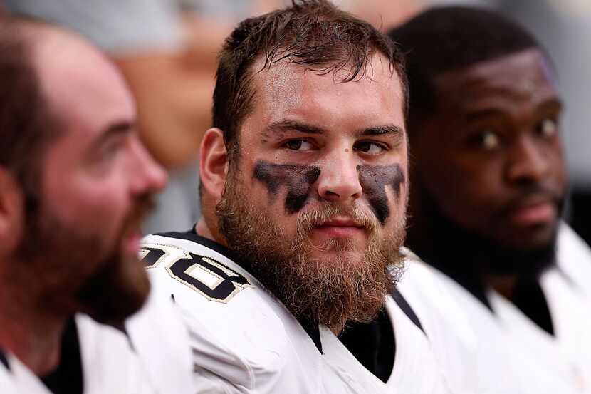 Center Tim Lelito #68 of the New Orleans Saints on the bench during the NFL game against the...